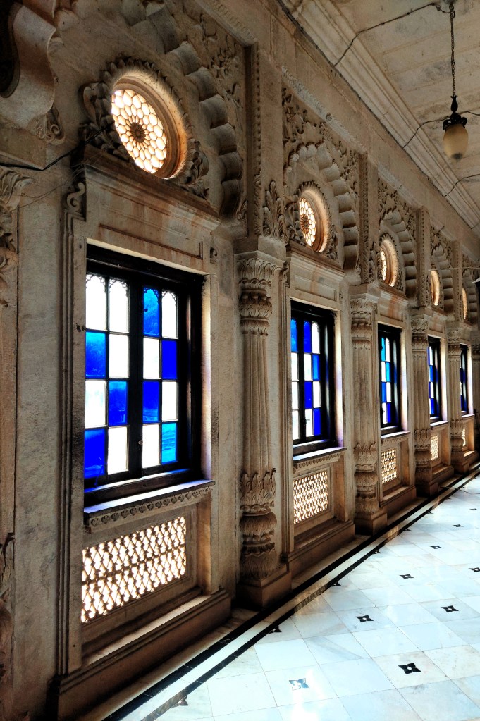 Blue stained - glass windows inside a Cenotaph
